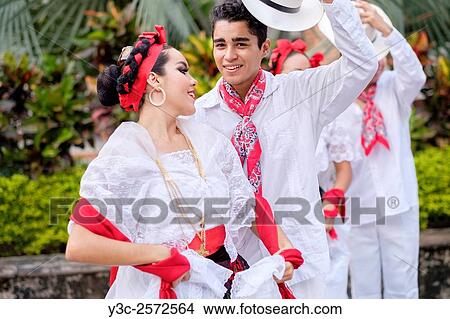 Young people in folkloristic costumes - Puerto Vallarta, Jalisco, Mexico. Xiutla Dancers - a folkloristic Mexican dance group in traditional costumes representing the culture and different regions of Mexico. View Large Photo Image Picture - Young people in folkloristic costumes - Puerto Vallarta, Jalisco, Mexico. Xiutla Dancers - a folkloristic Mexican dance group in traditional costumes representing the culture and different regions of Mexico.. Fotosearch
