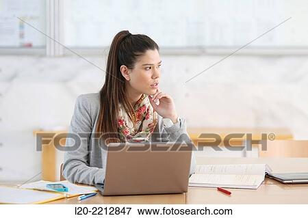 Stock Photo - Young students at campus. Fotosearch