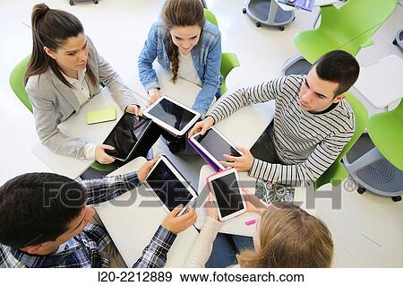 Young students at campus View Large Photo Image Stock Photo - Young students at campus. Fotosearch