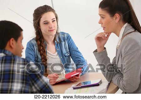 Stock Photograph - Young students at campus. Fotosearch