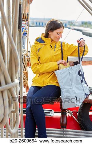 Young woman in a sailboat, galleon. Basque Country. Spain View Large Photo Image Picture - Young woman in a sailboat, galleon. Basque Country. Spain. Fotosearch