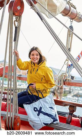 Young woman in a sailboat, galleon. Basque Country. Spain View Large Photo Image Stock Image - Young woman in a sailboat, galleon. Basque Country. Spain. Fotosearch
