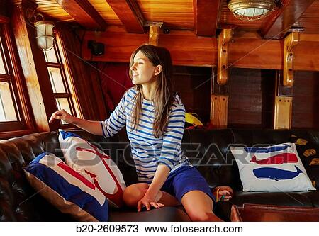 Young woman in a sailboat, galleon. Basque Country. Spain View Large Photo Image Stock Image - Young woman in a sailboat, galleon. Basque Country. Spain. Fotosearch