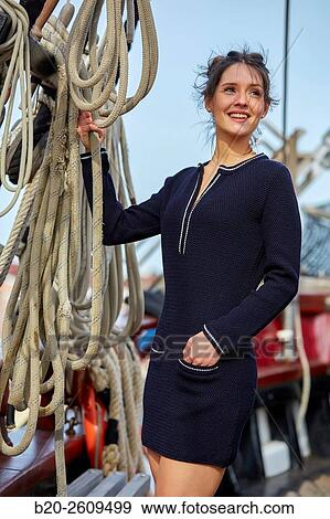 Young woman in a sailboat, galleon. Basque Country. Spain View Large Photo Image Stock Photo - Young woman in a sailboat, galleon. Basque Country. Spain. Fotosearch