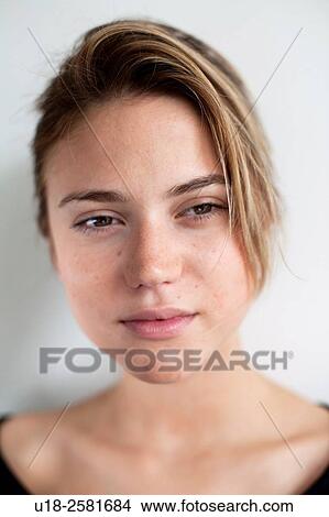 Picture - young woman wearing something black. Fotosearch