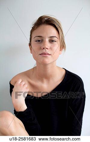 young woman wearing something black View Large Photo Image Stock Image - young woman wearing something black. Fotosearch