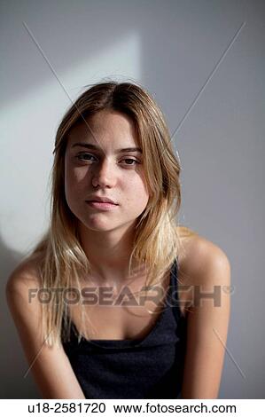young woman wearing something black View Large Photo Image Stock Image - young woman wearing something black. Fotosearch