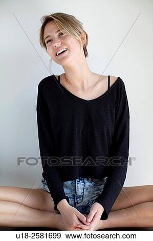 Stock Photo - young woman wearing something black. Fotosearch