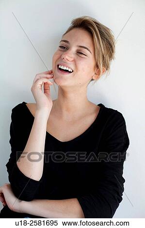 Stock Photography - young woman wearing something black. Fotosearch