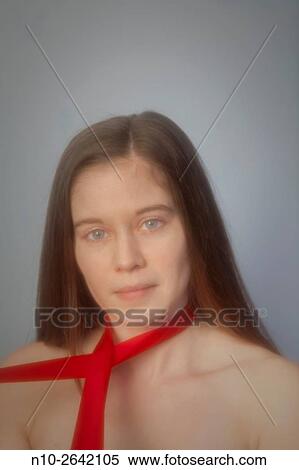 Young woman with a red ribbon. View Large Photo Image Stock Photography - Young woman with a red ribbon.. Fotosearch