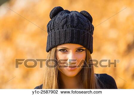 Young woman with wool cap View Large Photo Image Stock Image - Young woman with wool cap. Fotosearch