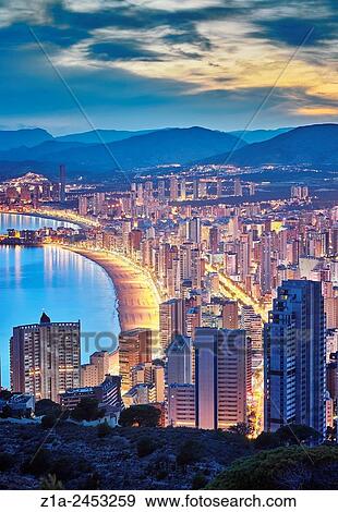 Aerial view of the east beach and the skyline by sunset. Benidorm. Alicante. Valencia Community. Spain. View Large Photo Image Stock Photo - Aerial view of the east beach and the skyline by sunset. Benidorm. Alicante. Valencia Community. Spain.. Fotosearch