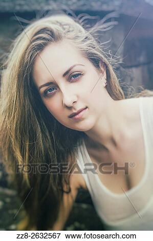 Attractive young woman outdoors. View Large Photo Image Stock Photo - Attractive young woman outdoors.. Fotosearch