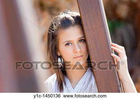 Attractive young woman portrait is daydreaming View Large Photo Image Stock Photograph - Attractive young woman portrait is daydreaming. Fotosearch