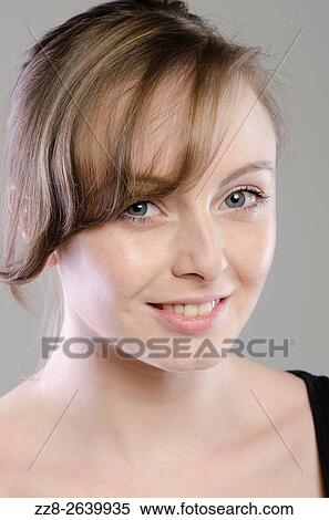 Beautiful young woman smiling. View Large Photo Image Stock Photography - Beautiful young woman smiling.. Fotosearch