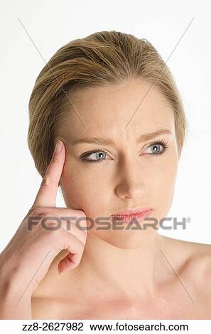 Beautiful young woman thinking. View Large Photo Image Stock Image - Beautiful young woman thinking.. Fotosearch