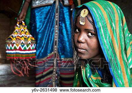 Stock Photo - Bride to be. She belongs to the Afar tribe. At Berahile ( Afar state, Ethiopia). Once married, she will become the third wife of her husband in a polygamous marriage.. Fotosearch