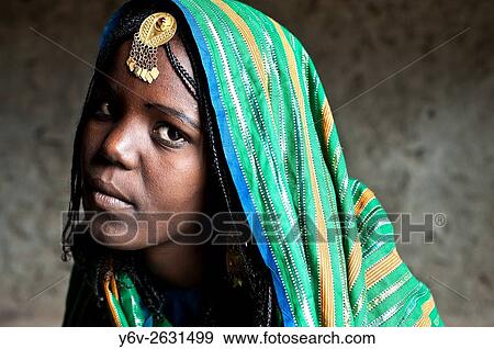 Bride to be. She belongs to the Afar tribe. At Berahile ( Afar state, Ethiopia). Once married, she will become the third wife of her husband in a polygamous marriage. View Large Photo Image Stock Photo - Bride to be. She belongs to the Afar tribe. At Berahile ( Afar state, Ethiopia). Once married, she will become the third wife of her husband in a polygamous marriage.. Fotosearch