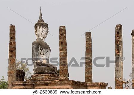 Buddha statue columns Wat Mahathat Sukhothai Thailand. View Large Photo Image Stock Photo - Buddha statue columns Wat Mahathat Sukhothai Thailand.. Fotosearch