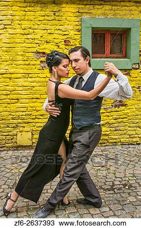 Buenos Aires Argentina La Boca tango dance with couple on street with colors worn walls with passion. View Large Photo Image Stock Image - Buenos Aires Argentina La Boca tango dance with couple on street with colors worn walls with passion.. Fotosearch