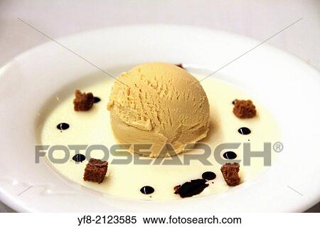 cheese ice cream with chocolate drops and sponge cake. View Large Photo Image Stock Photography - cheese ice cream with chocolate drops and sponge cake.. Fotosearch