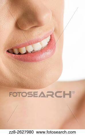 Close up of a young woman smiling. View Large Photo Image Stock Image - Close up of a young woman smiling.. Fotosearch