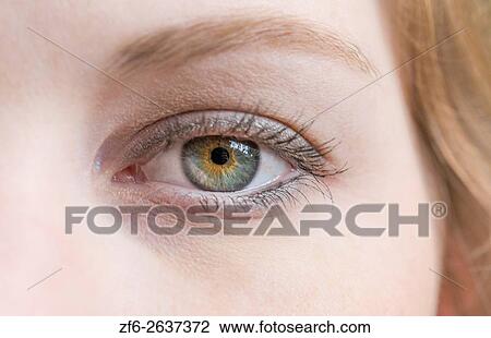 close-up of young womans eye and face blinking abstract MR model released. View Large Photo Image Stock Image - close-up of young womans eye and face blinking abstract MR model released.. Fotosearch