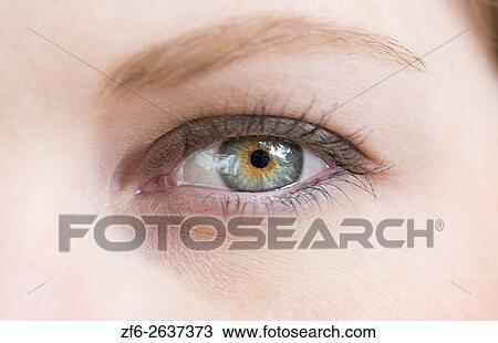 close-up of young womans eye and face blinking abstract MR model released. View Large Photo Image Stock Image - close-up of young womans eye and face blinking abstract MR model released.. Fotosearch