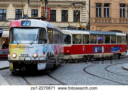 Stock Image - Czech Republic, Prague, View of tram on old town street, cobble stone. Fotosearch