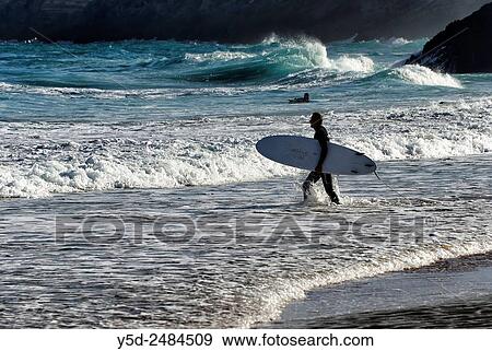 Europe, Portugal, Southern Portugal, Algarve region, Faro district, Sagres, Mareta beach - Praia da Mareta, surfers in waters of Atlantic Ocean View Large Photo Image Stock Photo - Europe, Portugal, Southern Portugal, Algarve region, Faro district, Sagres, Mareta beach - Praia da Mareta, surfers in waters of Atlantic Ocean. Fotosearch