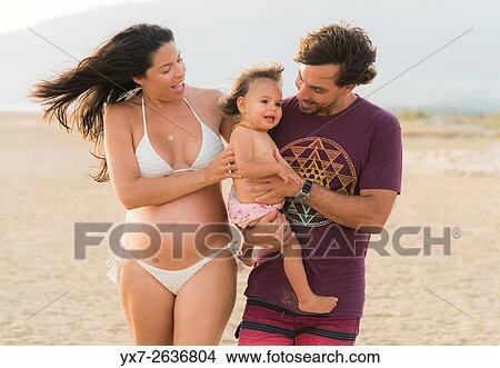 Picture - Family enjoying the beach. Tarifa, Costa de la Luz, Cadiz, Andalusia, Spain, Southern Europe.. Fotosearch