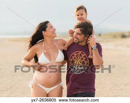 Family enjoying the beach. Tarifa, Costa de la Luz, Cadiz, Andalusia, Spain, Southern Europe. View Large Photo Image Stock Photography - Family enjoying the beach. Tarifa, Costa de la Luz, Cadiz, Andalusia, Spain, Southern Europe.. Fotosearch