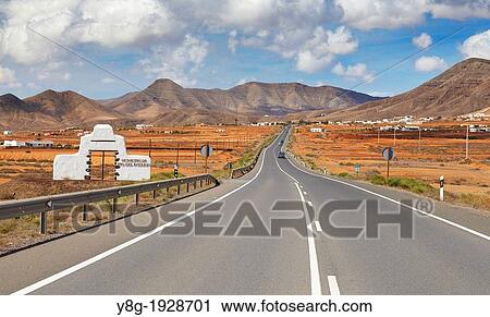 Stock Image - Fuerteventura Island landscape, road to Moro de la Atalaya, Canary Islands, Spain. Fotosearch