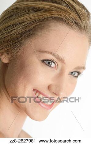 Happy young woman looking away smiling. View Large Photo Image Stock Image - Happy young woman looking away smiling.. Fotosearch