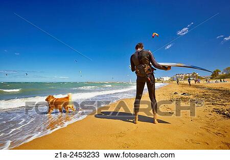 Kitesurfing at the beach. Denia. Alicante. Valencia Community. Spain. View Large Photo Image Stock Image - Kitesurfing at the beach. Denia. Alicante. Valencia Community. Spain.. Fotosearch