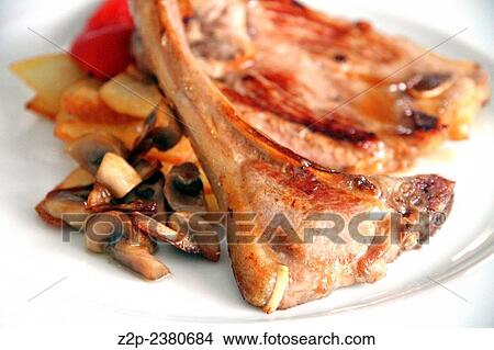 lamb chops with potatoes on plate. View Large Photo Image Picture - lamb chops with potatoes on plate.. Fotosearch