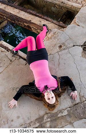 Lying on a derelict floor pretty girl View Large Photo Image Stock Photography - Lying on a derelict floor pretty girl. Fotosearch