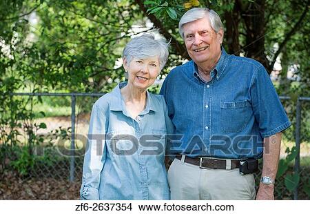 Picture - Mature retired couple married 49 years portrait in the park together in love MR Model released MR-1 MR- 2.. Fotosearch