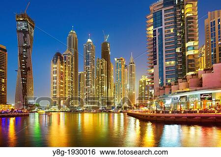 Stock Photograph - Modern skyscrapers on the canal of Dubai Marina, Dubai, United Arab Emirates. Fotosearch