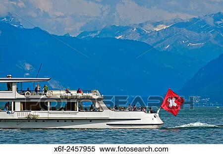 Motor vessel General Guisan of the shipping company CGN on a cruise on Lake Leman beneath the Alpes Vaudoises, Morges, Vaud, Switzerland. View Large Photo Image Stock Photography - Motor vessel General Guisan of the shipping company CGN on a cruise on Lake Leman beneath the Alpes Vaudoises, Morges, Vaud, Switzerland.. Fotosearch