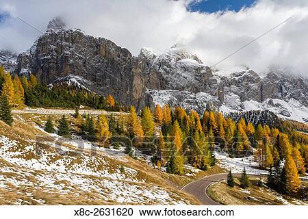 Mountain road leading up to Groedner Joch - Passo Gardena from the Groeden valley - Val Badia in the Dolomites of South Tyrol - Alto Adige. View towards mount Sella. The Dolomites are listed as UNESCO World heritage. europe, central europe, italy,... View Large Photo Image Stock Image - Mountain road leading up to Groedner Joch - Passo Gardena from the Groeden valley - Val Badia in the Dolomites of South Tyrol - Alto Adige. View towards mount Sella. The Dolomites are listed as UNESCO World heritage. europe, central europe, italy,.... Fotosearch