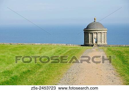 Stock Image - Mussenden Temple is a small circular building located on cliffs near Castlerock in County Derry. Northern Ireland. UK.. Fotosearch