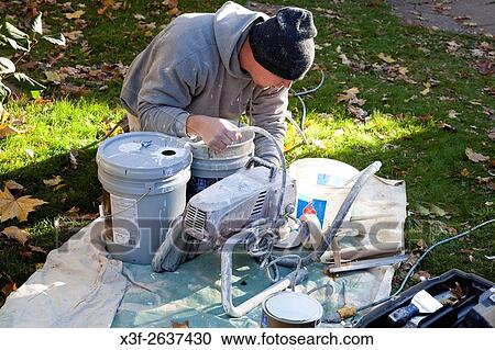 Painter preparing paint outside on a cool autumn day. St Paul Minnesota MN USA. View Large Photo Image Stock Image - Painter preparing paint outside on a cool autumn day. St Paul Minnesota MN USA.. Fotosearch