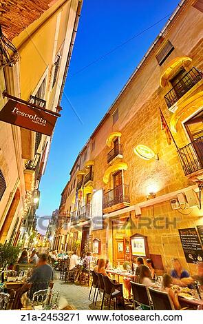Restaurant terraces at Loreto street by night. Denia. Alicante. Valencia Community. Spain. View Large Photo Image Stock Image - Restaurant terraces at Loreto street by night. Denia. Alicante. Valencia Community. Spain.. Fotosearch