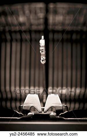 Retro vintage typewriter. Conceptual image of old fashioned office work, communication or writing. View Large Photo Image Stock Photography - Retro vintage typewriter. Conceptual image of old fashioned office work, communication or writing.. Fotosearch