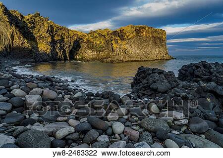 Rocky coastline at Hellnar, Snaefellnes Peninsula, Iceland.. View Large Photo Image Stock Image - Rocky coastline at Hellnar, Snaefellnes Peninsula, Iceland... Fotosearch