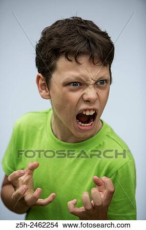 Russian Federation. Belgorod region. The boy with expressive face. View Large Photo Image Picture - Russian Federation. Belgorod region. The boy with expressive face.. Fotosearch