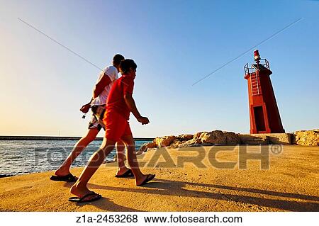 Seafront promenade at the harbour. Denia. Alicante. Valencia Community. Spain. View Large Photo Image Stock Photo - Seafront promenade at the harbour. Denia. Alicante. Valencia Community. Spain.. Fotosearch