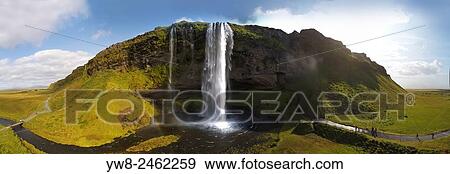 Seljalandsfoss Waterfall in the summer, panoramic view, shot using a drone, Iceland. View Large Photo Image Stock Photo - Seljalandsfoss Waterfall in the summer, panoramic view, shot using a drone, Iceland.. Fotosearch