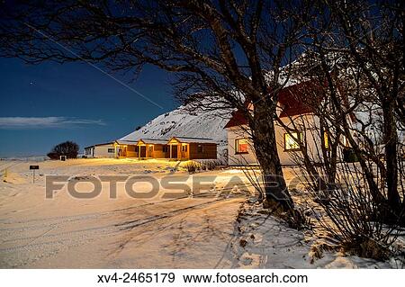 Small village of Hof with low northern lights above, Iceland. View Large Photo Image Stock Photo - Small village of Hof with low northern lights above, Iceland.. Fotosearch